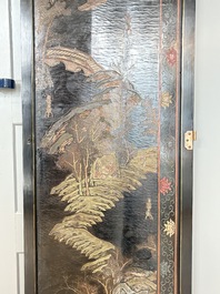A Chinese Coromandel lacquered four-panel folding screen with mountainous landscapes, 17/18th C.