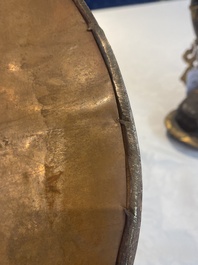 A Tibetan or Nepalese turquoise-inlaid partly-gilt bronze figure of White Tara, 20th C.