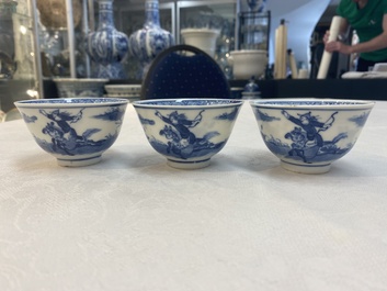 A set of 11 Chinese blue and white 'rabbit hunt' cups and saucers, Qianlong mark, 19th C.