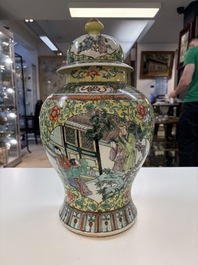 A pair of Chinese famille verte yellow-ground 'Xi Xiang Ji' vases and covers, 19th C.