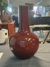 A Chinese copper-red-glazed bottle vase, 19th C.