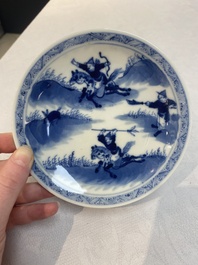 A set of 11 Chinese blue and white 'rabbit hunt' cups and saucers, Qianlong mark, 19th C.