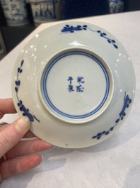 A set of 11 Chinese blue and white 'rabbit hunt' cups and saucers, Qianlong mark, 19th C.