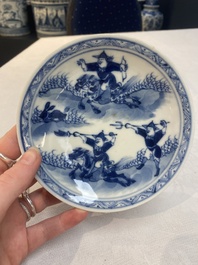 A set of 11 Chinese blue and white 'rabbit hunt' cups and saucers, Qianlong mark, 19th C.