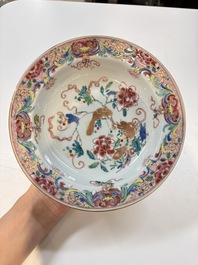 A set of 12 Chinese famille rose plates with squirrels among grapes and peonies, Qianlong