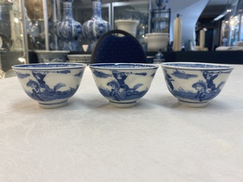 A set of 11 Chinese blue and white 'rabbit hunt' cups and saucers, Qianlong mark, 19th C.