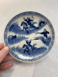 A set of 11 Chinese blue and white 'rabbit hunt' cups and saucers, Qianlong mark, 19th C.