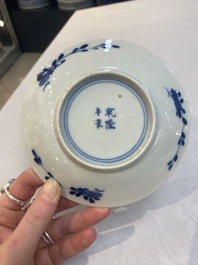 A set of 11 Chinese blue and white 'rabbit hunt' cups and saucers, Qianlong mark, 19th C.