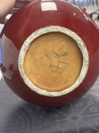 A Chinese copper-red-glazed bottle vase, 19th C.