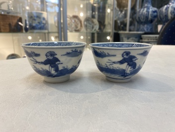 A set of 11 Chinese blue and white 'rabbit hunt' cups and saucers, Qianlong mark, 19th C.