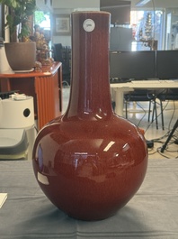 A Chinese copper-red-glazed bottle vase, 19th C.