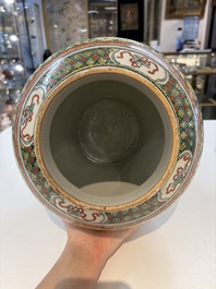 A pair of Chinese famille verte yellow-ground 'Xi Xiang Ji' vases and covers, 19th C.