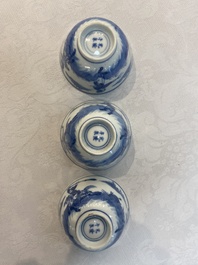 A set of 11 Chinese blue and white 'rabbit hunt' cups and saucers, Qianlong mark, 19th C.