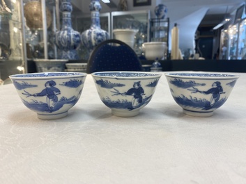 A set of 11 Chinese blue and white 'rabbit hunt' cups and saucers, Qianlong mark, 19th C.
