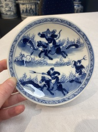 A set of 11 Chinese blue and white 'rabbit hunt' cups and saucers, Qianlong mark, 19th C.