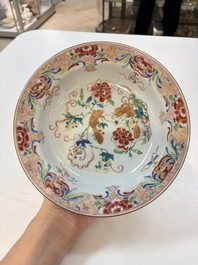 A set of 12 Chinese famille rose plates with squirrels among grapes and peonies, Qianlong