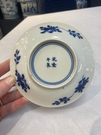 A set of 11 Chinese blue and white 'rabbit hunt' cups and saucers, Qianlong mark, 19th C.