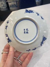 A set of 11 Chinese blue and white 'rabbit hunt' cups and saucers, Qianlong mark, 19th C.