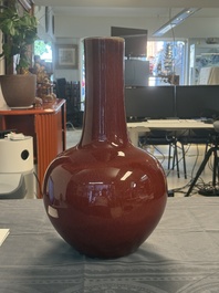 A Chinese copper-red-glazed bottle vase, 19th C.
