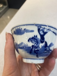 A set of 11 Chinese blue and white 'rabbit hunt' cups and saucers, Qianlong mark, 19th C.