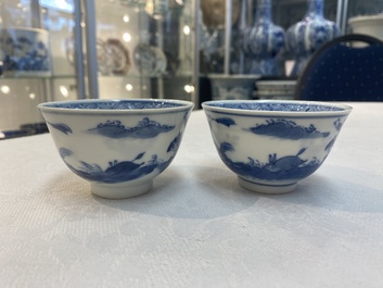 A set of 11 Chinese blue and white 'rabbit hunt' cups and saucers, Qianlong mark, 19th C.