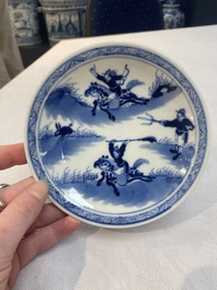 A set of 11 Chinese blue and white 'rabbit hunt' cups and saucers, Qianlong mark, 19th C.
