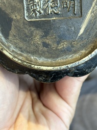 A Chinese bronze 'gu' vase with chilong, Xuande mark, late Ming/early Qing