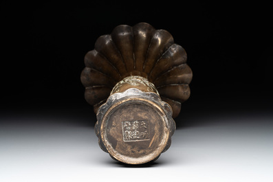 A Chinese bronze 'gu' vase with chilong, Xuande mark, late Ming/early Qing