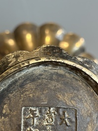 A Chinese bronze 'gu' vase with chilong, Xuande mark, late Ming/early Qing