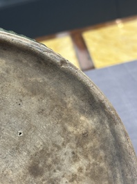 A Chinese Longquan celadon 'lotus' bowl and a large green-glazed Shiwan jar, Ming and later