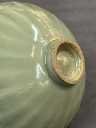 A Chinese Longquan celadon 'lotus' bowl and a large green-glazed Shiwan jar, Ming and later