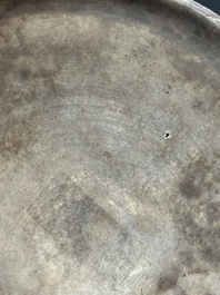 A Chinese Longquan celadon 'lotus' bowl and a large green-glazed Shiwan jar, Ming and later