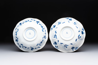 A pair of Chinese blue and white flower-shaped 'Long Eliza' plates, Kangxi