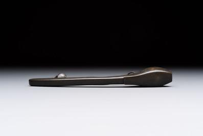 Nine various Japanese netsuke, an inro, a tsuba, a yatate, a bamboo kiseruzutsu and a covered bronze box, Edo/Meiji, 19th C.