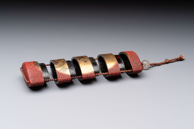 Nine various Japanese netsuke, an inro, a tsuba, a yatate, a bamboo kiseruzutsu and a covered bronze box, Edo/Meiji, 19th C.