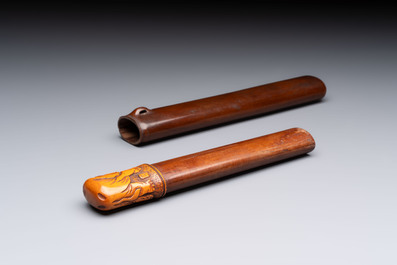 Nine various Japanese netsuke, an inro, a tsuba, a yatate, a bamboo kiseruzutsu and a covered bronze box, Edo/Meiji, 19th C.