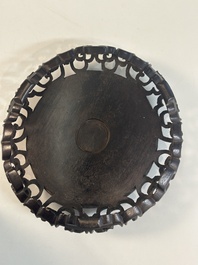 A collection of 11 Chinese wooden stands, 19/20th C.