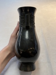 A fine Chinese archaistic bronze 'Touhu' vase with Taotie design, 17/18th C.