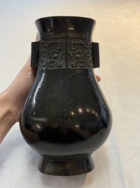 A fine Chinese archaistic bronze 'Touhu' vase with Taotie design, 17/18th C.