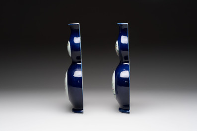 A pair of Chinese famille rose blue-ground wall pocket vases with floral design, Jing Shun Tang 經筍堂 mark, 19th C.