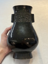 A fine Chinese archaistic bronze 'Touhu' vase with Taotie design, 17/18th C.