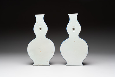 A pair of Chinese famille rose blue-ground wall pocket vases with floral design, Jing Shun Tang 經筍堂 mark, 19th C.