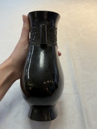 A fine Chinese archaistic bronze 'Touhu' vase with Taotie design, 17/18th C.