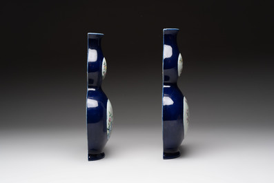 A pair of Chinese famille rose blue-ground wall pocket vases with floral design, Jing Shun Tang 經筍堂 mark, 19th C.