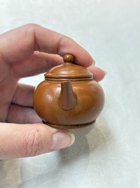 A small Chinese Yixing stoneware covered teapot and two Swatow Yixing-style covered teapots, Yixing Hui Mengchen 宜興惠孟臣製 and Shunji 順記 marks, 19/20th C.