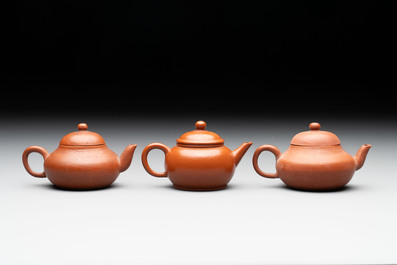 A small Chinese Yixing stoneware covered teapot and two Swatow Yixing-style covered teapots, Yixing Hui Mengchen 宜興惠孟臣製 and Shunji 順記 marks, 19/20th C.