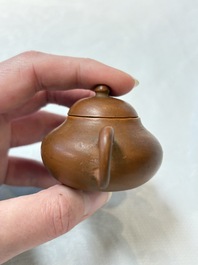 A small Chinese Yixing stoneware covered teapot and two Swatow Yixing-style covered teapots, Yixing Hui Mengchen 宜興惠孟臣製 and Shunji 順記 marks, 19/20th C.