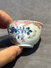 A pair of Chinese polychrome-decorated cups and saucers and an iron-red gilt-decorated cup and saucer, Yongzheng/Qianlong