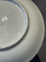 A pair of Chinese polychrome-decorated cups and saucers and an iron-red gilt-decorated cup and saucer, Yongzheng/Qianlong