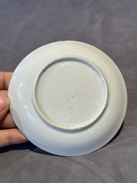 A pair of Chinese polychrome-decorated cups and saucers and an iron-red gilt-decorated cup and saucer, Yongzheng/Qianlong